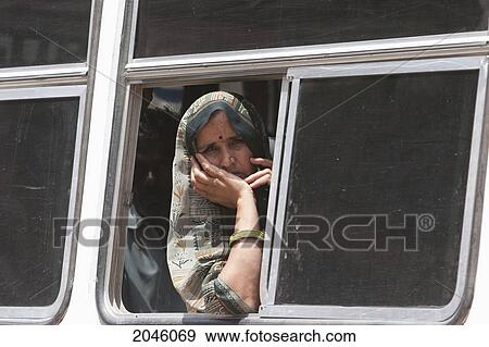 Woman On A Bus In Nawalgarh, Rajasthan, India View Large Photo Image Stock Photo - Woman On A Bus In Nawalgarh, Rajasthan, India. Fotosearch