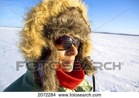 Woman On A Lake Ice Fishing, James-Bay, Quebec View Large Photo Image Picture - Woman On A Lake Ice Fishing, James-Bay, Quebec. Fotosearch