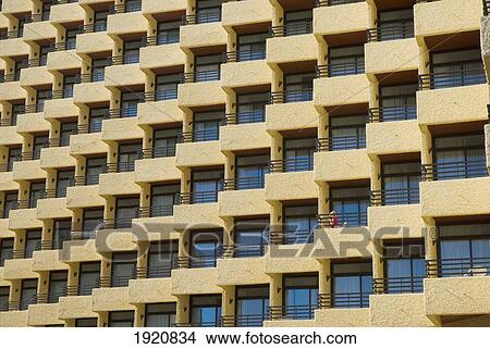Picture - Woman On Balcony Of Hotel, Torremolinos, Andalucia, Spain. Fotosearch