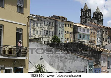 Stock Image - Woman On Balcony. Fotosearch