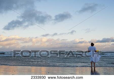 Stock Image - Woman On Casino Beach; Rio Grande Do Sul, Brazil. Fotosearch