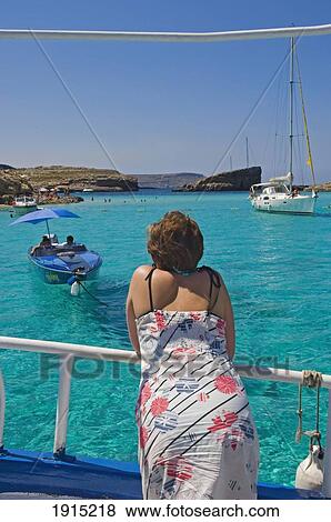 Woman On Cruise Around Blue Lagoon View Large Photo Image Stock Photo - Woman On Cruise Around Blue Lagoon. Fotosearch