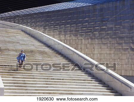 Woman On Steps Of Guggenheim Museum View Large Photo Image Stock Image - Woman On Steps Of Guggenheim Museum. Fotosearch
