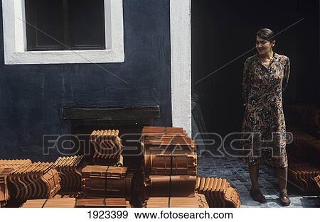 Stock Photo - Woman On The Street, Old Town. Fotosearch