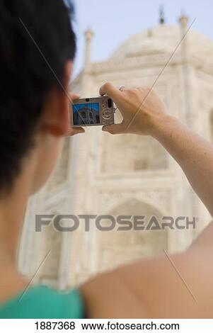 Woman Photographing The Taj Mahal At Dawn, Close Up View Large Photo Image Stock Photo - Woman Photographing The Taj Mahal At Dawn, Close Up. Fotosearch