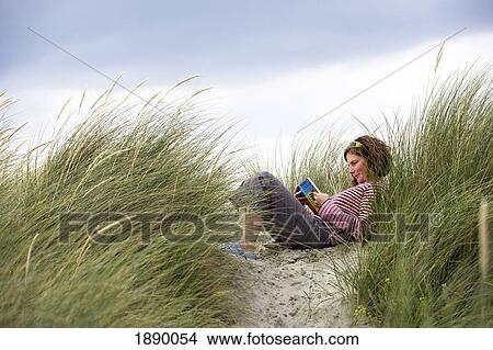 Woman Reading On Beach View Large Photo Image Picture - Woman Reading On Beach. Fotosearch