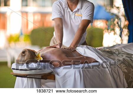 Woman Receiving Massage In Spa Resort; Fairmont Kea Lani, Outdoor Gazebo Spa, Wailea, Maui, Hawaii, Usa View Large Photo Image Stock Image - Woman Receiving Massage In Spa Resort; Fairmont Kea Lani, Outdoor Gazebo Spa, Wailea, Maui, Hawaii, Usa. Fotosearch