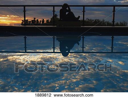 Woman Reflected In Swimming Pool At Dusk View Large Photo Image Stock Image - Woman Reflected In Swimming Pool At Dusk. Fotosearch