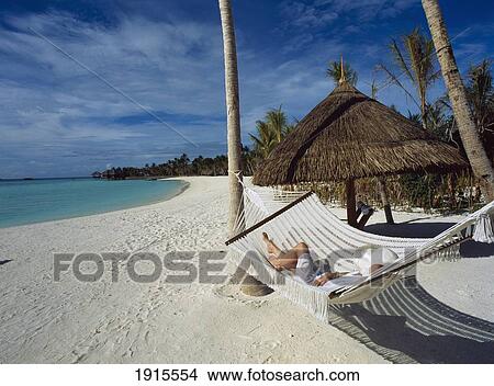 Woman Relaxing In Hammock View Large Photo Image Picture - Woman Relaxing In Hammock. Fotosearch
