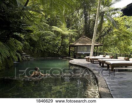 Woman Relaxing In Holiday Resort View Large Photo Image Stock Photo - Woman Relaxing In Holiday Resort. Fotosearch