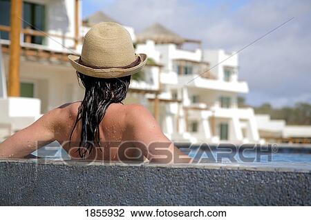 Stock Image - Woman Relaxing On Vacation, Cabo San Lucas, Mexico. Fotosearch