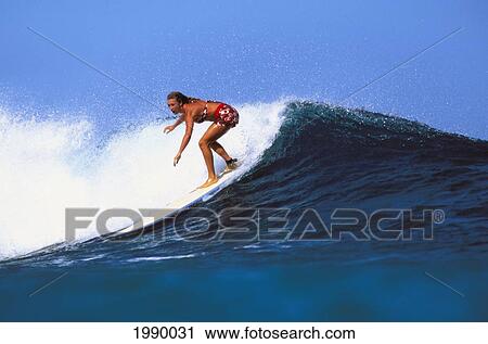 Woman Rides Deep Blue Wave, Clear Sky View Large Photo Image Stock Image - Woman Rides Deep Blue Wave, Clear Sky. Fotosearch