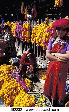 Woman Selling Garlands. Kathmandu, Nepal. View Large Photo Image Stock Image - Woman Selling Garlands. Kathmandu, Nepal.. Fotosearch