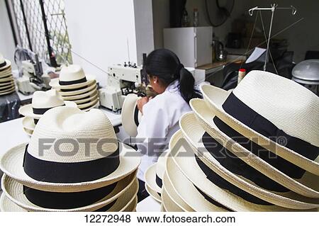 Woman sewing the black brim on to a panama hat at the Homero Ortega Panama Hat Factory, Cuenca, Azuay, Ecuador View Large Photo Image Stock Photo - Woman sewing the black brim on to a panama hat at the Homero Ortega Panama Hat Factory, Cuenca, Azuay, Ecuador. Fotosearch
