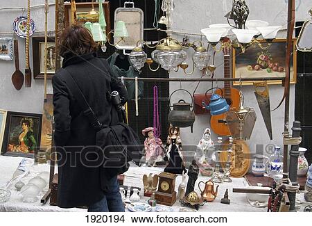 Woman Shopping At El Rastro Flea Market, Madrid, Andalucia, Spain View Large Photo Image Picture - Woman Shopping At El Rastro Flea Market, Madrid, Andalucia, Spain. Fotosearch