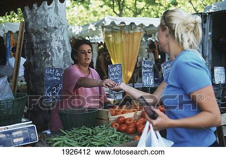Woman Shopping In Market; St. Tropez, Cote D'azur, France View Large Photo Image Stock Image - Woman Shopping In Market; St. Tropez, Cote D'azur, France. Fotosearch