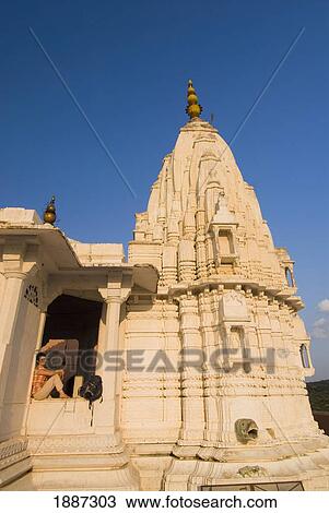 Woman Sitting In Small Temple View Large Photo Image Stock Image - Woman Sitting In Small Temple. Fotosearch