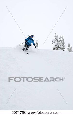 Woman Skiing, Below Lago Peak In The Cascade Mountains Near The Coquihalla Highway, British Columbia View Large Photo Image Stock Photo - Woman Skiing, Below Lago Peak In The Cascade Mountains Near The Coquihalla Highway, British Columbia. Fotosearch