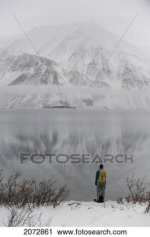 Woman Snowshoeing In Winter, Kathleen Lake, Kluane National Park, Yukon, Canada View Large Photo Image Stock Image - Woman Snowshoeing In Winter, Kathleen Lake, Kluane National Park, Yukon, Canada. Fotosearch