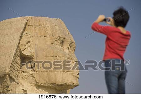 Woman Taking Photo Of Sphinx View Large Photo Image Stock Photograph - Woman Taking Photo Of Sphinx. Fotosearch