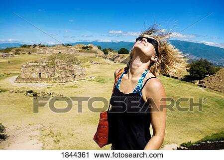 Woman Tossing Hair In Wind; Monte Alban, Mexico View Large Photo Image Stock Image - Woman Tossing Hair In Wind; Monte Alban, Mexico. Fotosearch