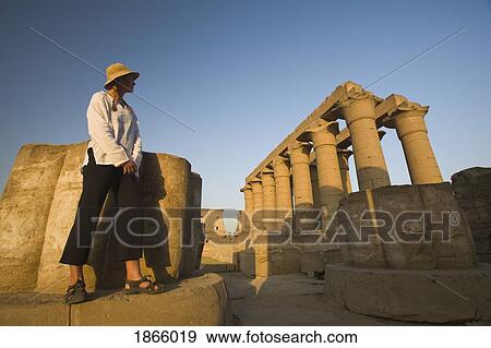 Woman Tourist At The Temple Of Luxor, Egypt View Large Photo Image Stock Photo - Woman Tourist At The Temple Of Luxor, Egypt. Fotosearch