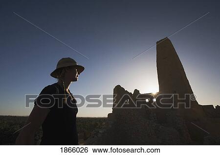 Stock Photograph - Woman Tourist At The Temple Of The Oracle (Temple Of Amun), Siwa Oasis, Egypt. Fotosearch