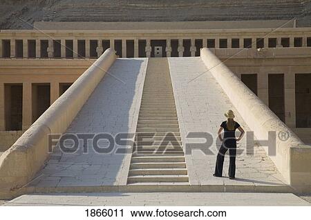 Woman Tourist Gazes At The Temple Of Hatshepsut, Luxor, Nile Valley, Egypt View Large Photo Image Stock Image - Woman Tourist Gazes At The Temple Of Hatshepsut, Luxor, Nile Valley, Egypt. Fotosearch