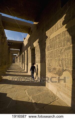 Stock Photo - Woman Walking Along West Colonnade. Fotosearch