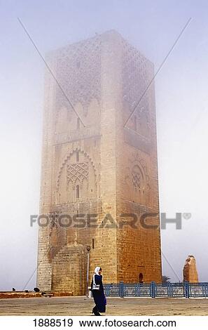 Stock Photo - Woman Walking In Front Of Hassan Mosque. Fotosearch