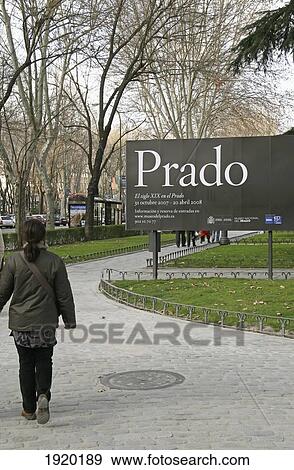 Stock Photo - Woman Walking Near Prado Museum, Rear View, Madrid, Spain. Fotosearch