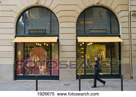 Woman Walking Past The Hermes Shop On Rue St Honore, Paris, France View Large Photo Image Stock Photography - Woman Walking Past The Hermes Shop On Rue St Honore, Paris, France. Fotosearch