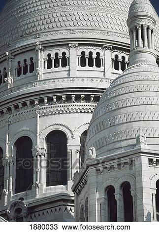 Stock Image - Woman Walking Up Stairs Of Louvre Museum Pyramid. Fotosearch