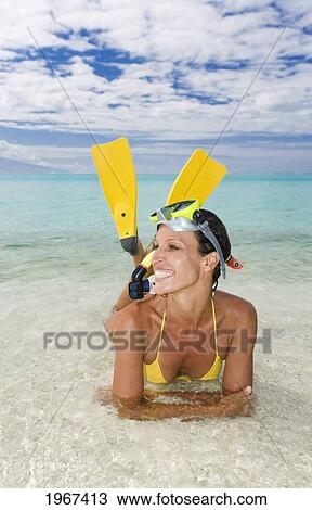 Woman Wearing Snorkel Gear Near Ocean's Edge. View Large Photo Image Stock Image - Woman Wearing Snorkel Gear Near Ocean's Edge.. Fotosearch