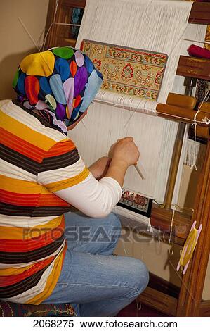 Woman Weaving A Rug; Istanbul Turkey View Large Photo Image Stock Photography - Woman Weaving A Rug; Istanbul Turkey. Fotosearch