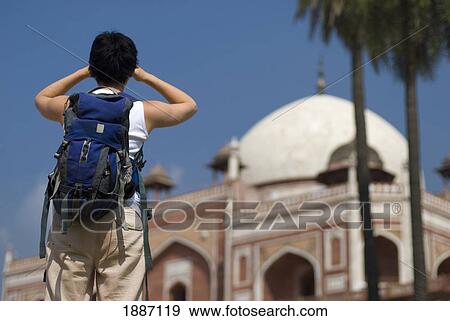 Woman With Backpack Admiring Humayun's Tomb, Rear View View Large Photo Image Stock Photo - Woman With Backpack Admiring Humayun's Tomb, Rear View. Fotosearch