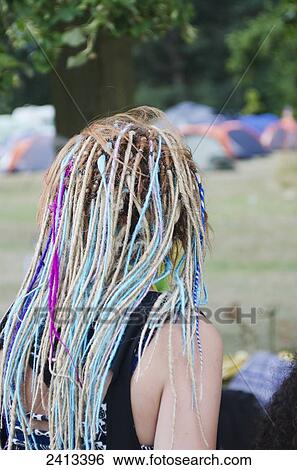 Stock Photograph - Woman with multi-coloured dreadlocks at the health festival; Reading, Berkshire, England. Fotosearch