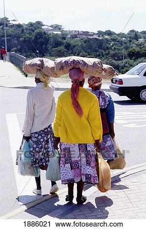 Woman With Sacks On Their Heads Crossing The Street Carrying Shopping View Large Photo Image Stock Image - Woman With Sacks On Their Heads Crossing The Street Carrying Shopping. Fotosearch