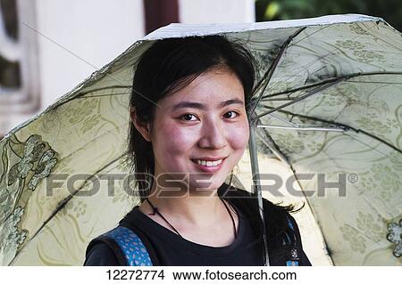 Picture - Woman with umbrella, Suzhou, Jiangsu, China. Fotosearch