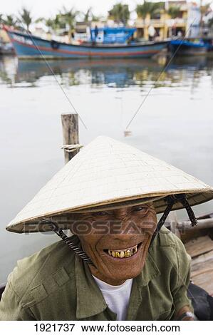 Woman With Yoke On Covered Bridge, Hoi An, Vietnam View Large Photo Image Stock Photo - Woman With Yoke On Covered Bridge, Hoi An, Vietnam. Fotosearch