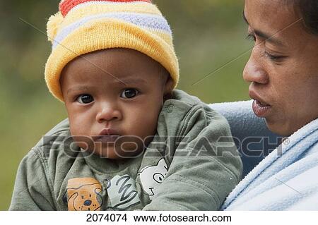 Picture - Woman & Young Boy In Ambohimanga, Antananarivo Province, Madagascar. Fotosearch