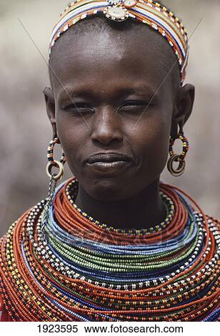 Stock Photography - Women Adorned With Beads. Fotosearch