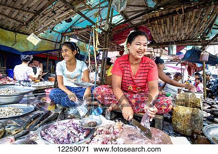 Women at fish market; Yangoon, Myanmar View Large Photo Image Stock Image - Women at fish market; Yangoon, Myanmar. Fotosearch