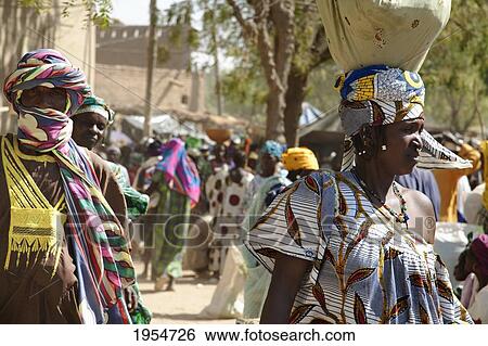 Stock Photograph - Women at Monday Market in Djenne, Mali. Fotosearch