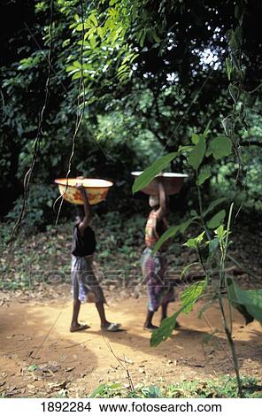 Women Carrying Buckets Of Water View Large Photo Image Picture - Women Carrying Buckets Of Water. Fotosearch