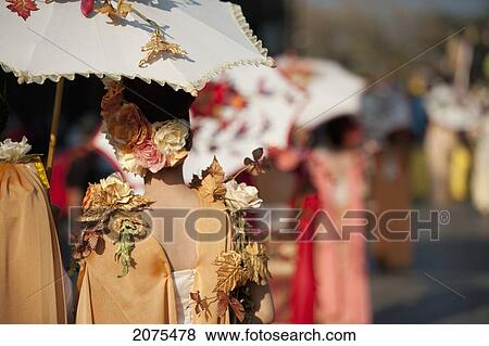 Stock Photo - Women Dressed For The Chiang Mai Flower Festival Parade; Chiang Mai Thailand. Fotosearch