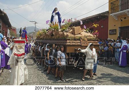 Picture - Women Dressed In Mourning Carry The Anda (Float) Of The Virgin Mary During The Procession Of The Holy Cross On Good Friday In Antigua Guatemala, Sacatep. Fotosearch
