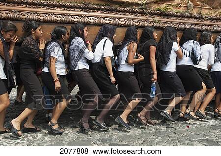 Women Dressed In Mourning Carry The Anda (Float) Of The Sorrowful Virgin Mary During A Good Friday Procession In Antigua Guatemala, Sacatep View Large Photo Image Stock Photo - Women Dressed In Mourning Carry The Anda (Float) Of The Sorrowful Virgin Mary During A Good Friday Procession In Antigua Guatemala, Sacatep. Fotosearch