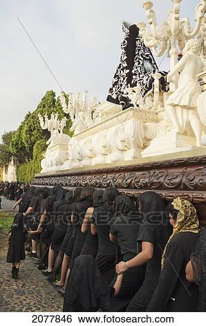 Women Dressed In Mourning Carry The Anda (Float) Of The Sorrowful Virgin Mary During The Holy Burial Procession On Good Friday In Antigua Guatemala, Sacatep View Large Photo Image Stock Photograph - Women Dressed In Mourning Carry The Anda (Float) Of The Sorrowful Virgin Mary During The Holy Burial Procession On Good Friday In Antigua Guatemala, Sacatep. Fotosearch