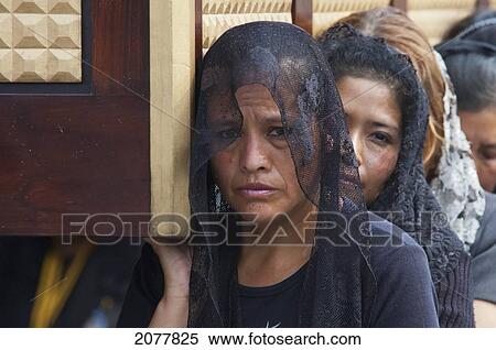 Women Dressed In Mourning Carry The Anda (Float) Of The Sorrowful Virgin Mary During A Good Friday Procession In Antigua Guatemala, Sacatep View Large Photo Image Stock Photography - Women Dressed In Mourning Carry The Anda (Float) Of The Sorrowful Virgin Mary During A Good Friday Procession In Antigua Guatemala, Sacatep. Fotosearch